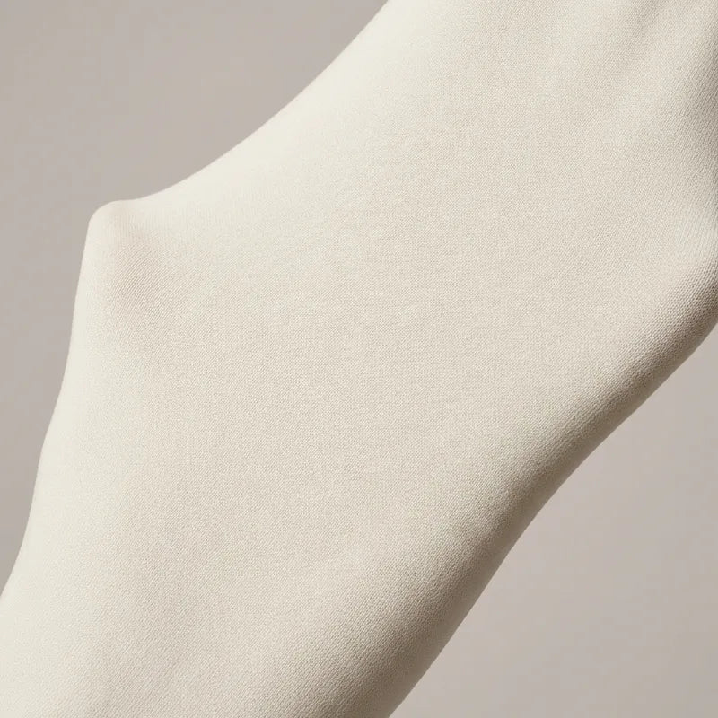 The same knit stretched — still fully opaque